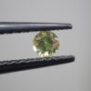 宇宙からの宝石☆インドネシア産☆虹針入り パラサイトペリドット 0.085ct